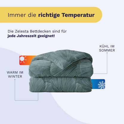Eine gefaltete Royalbed Baumwolle - Botanical Green Bettdecke mit Text, dass sie im Winter wärmt und im Sommer kühlt - die ideale temperaturregulierende Decke für das ganze Jahr.