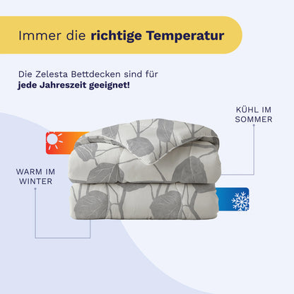 Die Royalbed Baumwolle - Spring Buds Bettdecke mit grauem Blattmuster sorgt für eine optimale Temperaturregulierung und hält Sie im Winter warm und im Sommer kühl - ideal für alle Jahreszeiten.